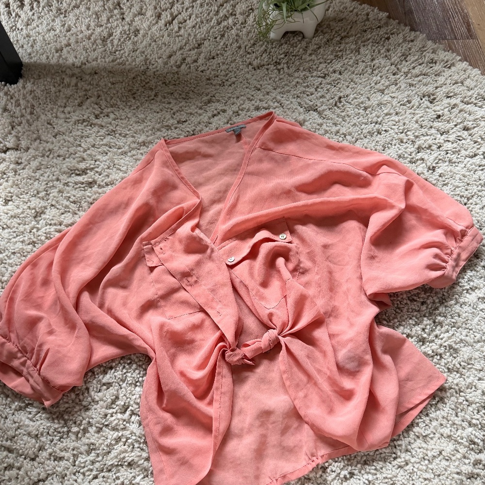 Stylish coral Charlotte Russe Coral button down crop top pocketed Blouse with Kn